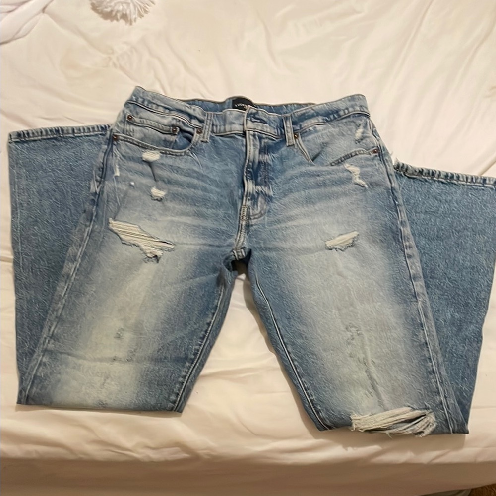 Distressed Blue Denim Jeans